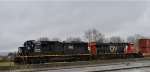 waiting for a fresh crew in Fisher Siding, IC 1011 leading CN 2897, a unit stack train headed E/B to Chicago from Delta, B.C.